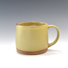 Load image into Gallery viewer, Avocado green Lake Clay mug on gradient grey background

