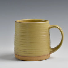 Load image into Gallery viewer, Avocado Lake Clay mug on a gray background
